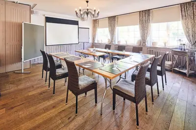 Ein Sitzbereich in der Unterkunft Hotel & Restaurant Grenzhof