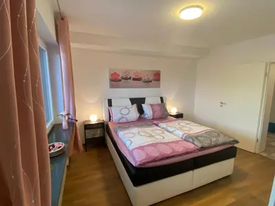Ein Bett oder Betten in einem Zimmer der Unterkunft Ferienwohnung Nuß