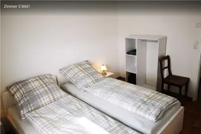 Ein Bett oder Betten in einem Zimmer der Unterkunft Birkenblick - Ferienwohnung Owwe