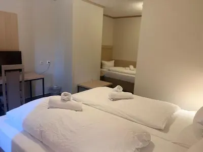 Ein Bett oder Betten in einem Zimmer der Unterkunft Altes Sudhaus