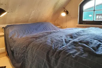Ein Bett oder Betten in einem Zimmer der Unterkunft Tiny Loft (Haus) im Südhessischen Ried