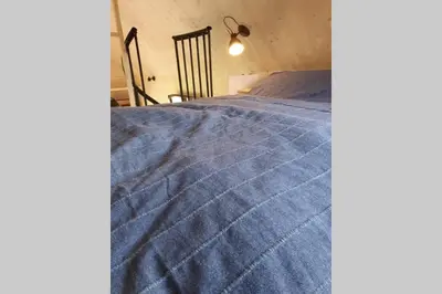 Ein Bett oder Betten in einem Zimmer der Unterkunft Tiny Loft (Haus) im Südhessischen Ried