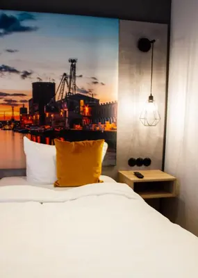 Ein Bett oder Betten in einem Zimmer der Unterkunft Hotel-Restaurant Steuermann