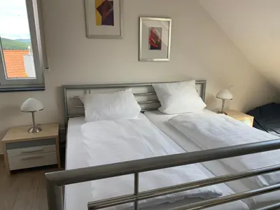 Ein Bett oder Betten in einem Zimmer der Unterkunft FreiRaum