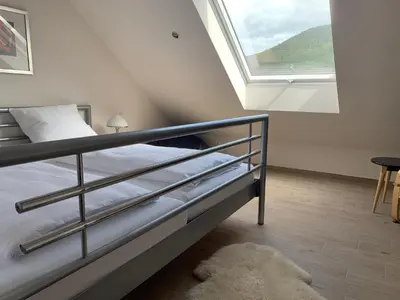 Ein Bett oder Betten in einem Zimmer der Unterkunft FreiRaum