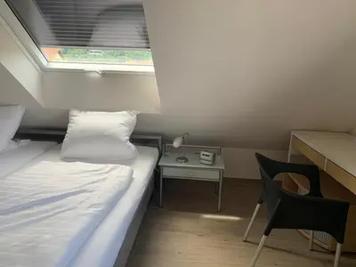Ein Bett oder Betten in einem Zimmer der Unterkunft FreiRaum