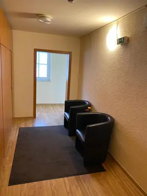 Ein Sitzbereich in der Unterkunft Hotel Weller