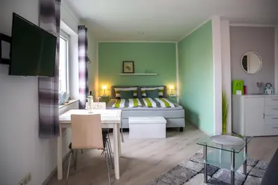 Ein Bett oder Betten in einem Zimmer der Unterkunft Ferienwohnung Toskana mit Schwimmbad und Sauna
