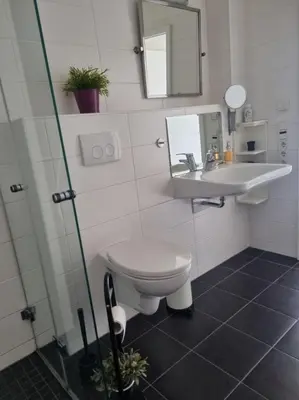 Ein Badezimmer in der Unterkunft Ludwigshöhe EG