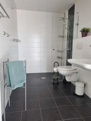 Ein Badezimmer in der Unterkunft Ludwigshöhe EG
