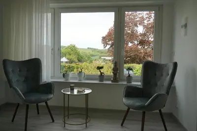 Ein Sitzbereich in der Unterkunft Ferienwohnung Lieblingsplatz
