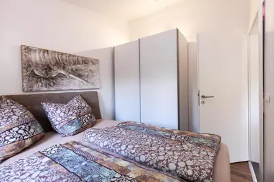 Ein Bett oder Betten in einem Zimmer der Unterkunft Ferienwohnung - Nähe Kaiserslautern