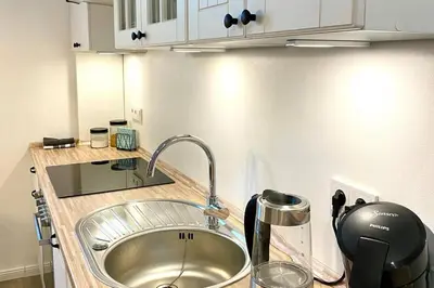 Küche/Küchenzeile in der Unterkunft Zentral gelegene Ferienwohnung im Herzen der Pfalz
