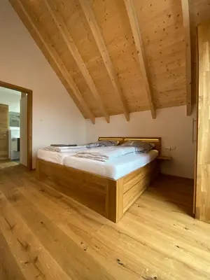 Ein Bett oder Betten in einem Zimmer der Unterkunft Ferienwohnung Apfelkrönchen