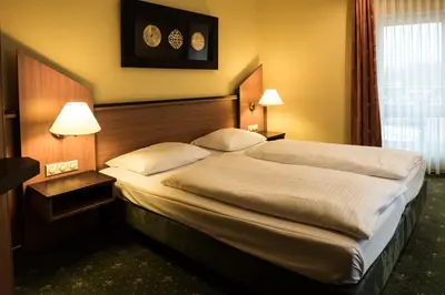 Ein Bett oder Betten in einem Zimmer der Unterkunft Hotel Sperling mit E-Ladestation