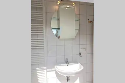 Ein Badezimmer in der Unterkunft Hell Modern Gemütlich Großes 1 Zimmer Apartment Ilvesheim