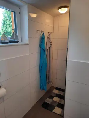 Ein Badezimmer in der Unterkunft Ferienhaus auf dem Lusitanohof Jäger