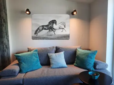 Ein Sitzbereich in der Unterkunft Ferienhaus auf dem Lusitanohof Jäger