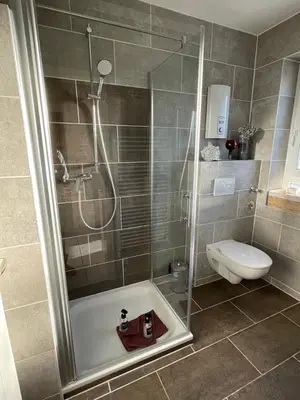 Ein Badezimmer in der Unterkunft Wohnen beim Brotsommelier - Holzmichel