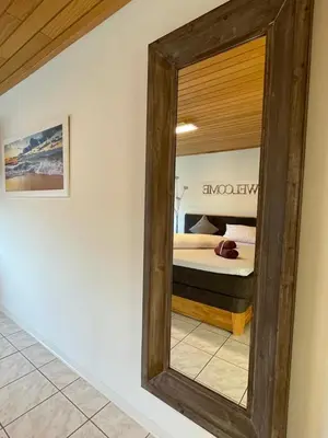 Ein Bett oder Betten in einem Zimmer der Unterkunft Wohnen beim Brotsommelier - Holzmichel