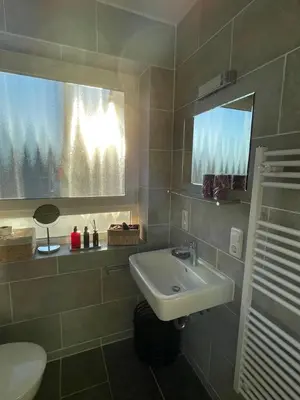Ein Badezimmer in der Unterkunft Wohnen beim Brotsommelier - Holzmichel