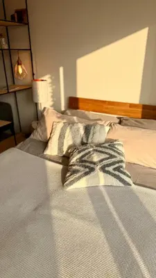 Ein Bett oder Betten in einem Zimmer der Unterkunft 'Das kleine Feine' - Ruhige, helle Ferienwohnung mit Parkplatz und Balkon