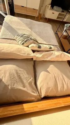 Ein Bett oder Betten in einem Zimmer der Unterkunft 'Das kleine Feine' - Ruhige, helle Ferienwohnung mit Parkplatz und Balkon
