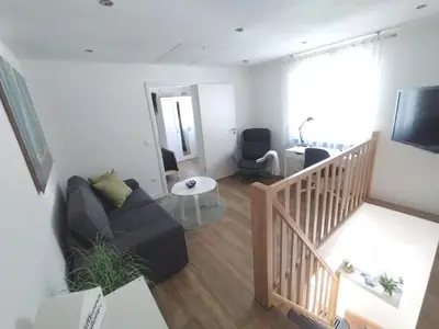 Ein Sitzbereich in der Unterkunft Das Mini-Haus im Herzen Großostheims