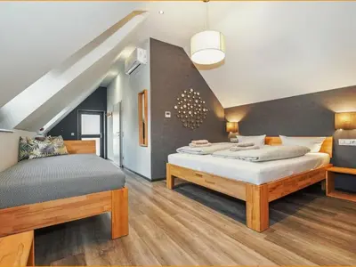 Ein Bett oder Betten in einem Zimmer der Unterkunft Hotel Landlust St. Martin