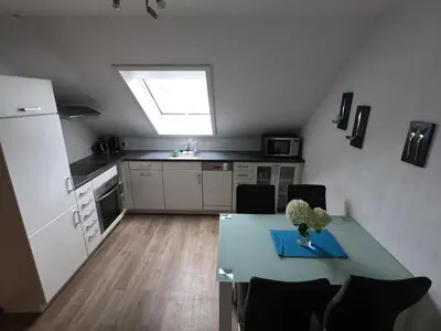 Küche/Küchenzeile in der Unterkunft Moderne Ferienwohnung in Durmersheim 2 Zi, Nähe Rhein und Messe KA