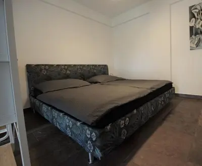 Ein Bett oder Betten in einem Zimmer der Unterkunft Ruhe Oase mit tollem Fernblick inmitten der Natur