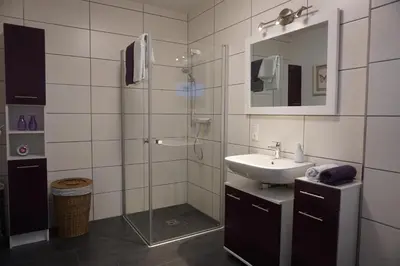 Ein Badezimmer in der Unterkunft FeWo am Neckarsteig mit Anbindung an Heidelberg