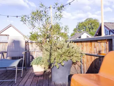Ein Balkon oder eine Terrasse in der Unterkunft Klimatisierte Wohnung mit großer Terrasse