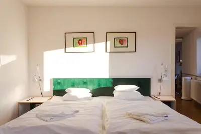 Ein Bett oder Betten in einem Zimmer der Unterkunft Klimatisierte Wohnung mit großer Terrasse
