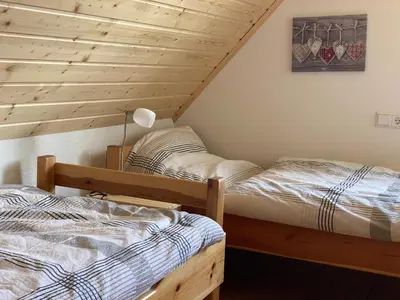 Ein Bett oder Betten in einem Zimmer der Unterkunft Grimm´s Landhaus