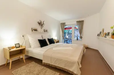 Ein Bett oder Betten in einem Zimmer der Unterkunft Ruhiges Apartment Ettlingen-Spessart