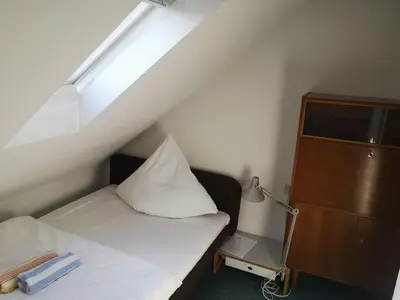 Ein Bett oder Betten in einem Zimmer der Unterkunft Juni o