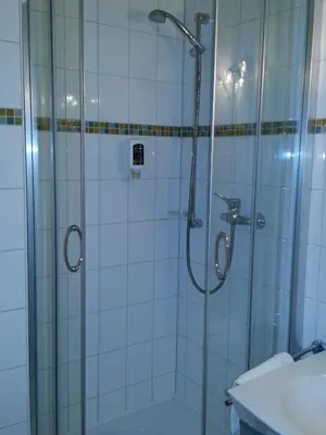 Ein Badezimmer in der Unterkunft Hotel AVIVA by APOLONIA