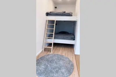 Ein Bett oder Betten in einem Zimmer der Unterkunft Ferienwohnung Sandhausen Heidelberg V1