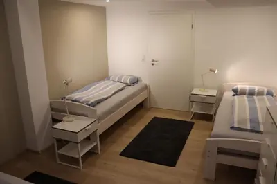 Ein Bett oder Betten in einem Zimmer der Unterkunft Apartment 