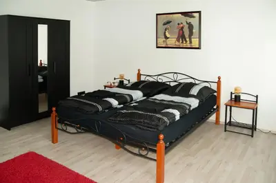 Ein Bett oder Betten in einem Zimmer der Unterkunft Ferienwohnung Jagsthausen