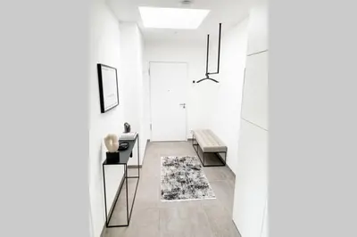 Grundriss der Unterkunft Luxuriöses Neubau-Apartment mit e-Lade Parkplatz