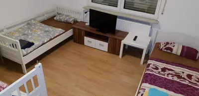 Ein Bett oder Betten in einem Zimmer der Unterkunft Private Unterkunft Askinartar