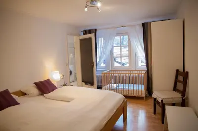Ein Bett oder Betten in einem Zimmer der Unterkunft Heidelberg Apheartments