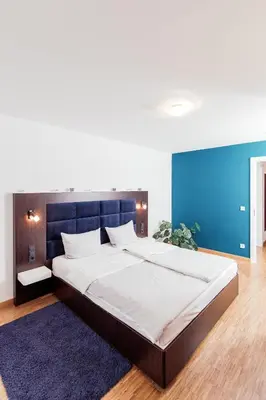 Ein Bett oder Betten in einem Zimmer der Unterkunft Fabelhafte Wohnungen in der Altstadt