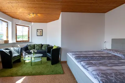 Ein Bett oder Betten in einem Zimmer der Unterkunft Ferienwohnung Hauk