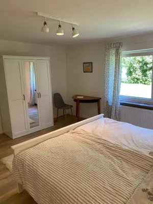 Ein Bett oder Betten in einem Zimmer der Unterkunft Ferienwohnung miraBelle