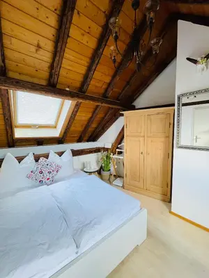 Ein Bett oder Betten in einem Zimmer der Unterkunft Ferienhaus Zur Hofreite