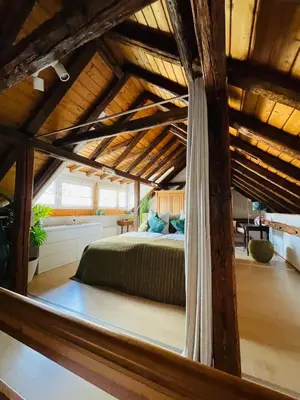 Ein Bett oder Betten in einem Zimmer der Unterkunft Ferienhaus Zur Hofreite