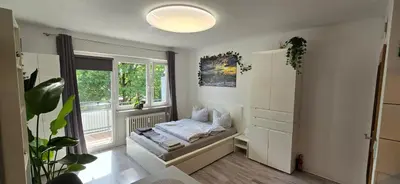 Ein Bett oder Betten in einem Zimmer der Unterkunft MsApartment Stylish wohnen in STUTTGART Self-Check-in zu jeder Zeit voll automatisiert